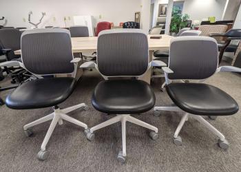 Black wheeled conference room chair