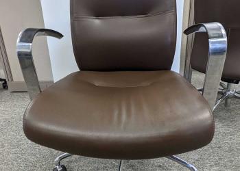 Brown wheeled executive office chair