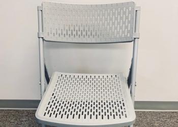 Used Light Gray Folding Chair