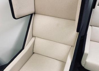 Used Cream Swiveling Lounge Chair