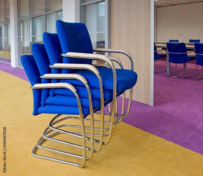 Blue stackable chairs in the office