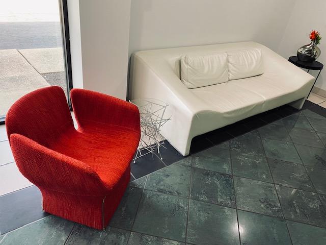 Used Cherry Red Lounge Chair, White Sofa, & Glass Top & Black Side Tables