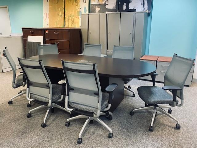 Used Oval Conference Table & Gray Mesh Back Rolling Chairs
