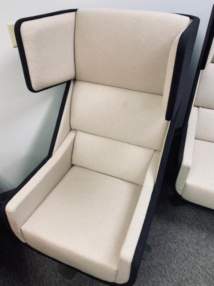 Used Cream Swiveling Lounge Chair